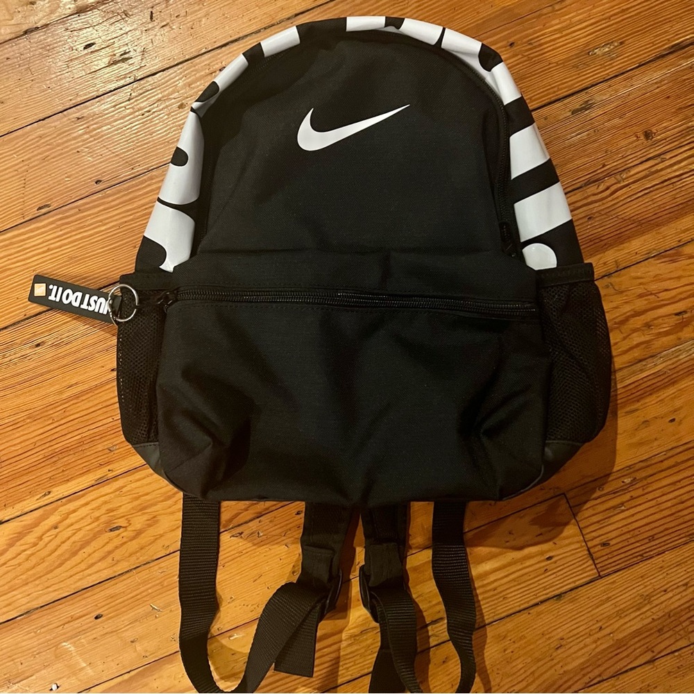 Nike Just Do It Logo Black and White Mini  Backpack Front Zipper Pocket